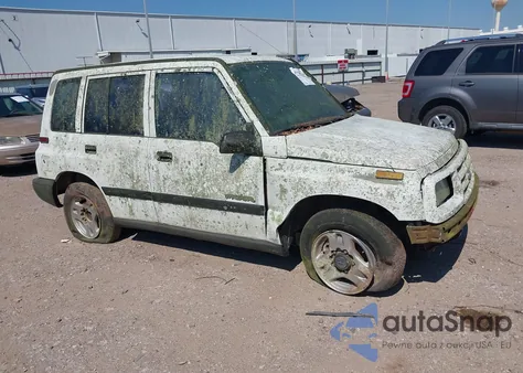 1996 Geo Tracker from USA, damaged, VIN 2CNBE1369T6943219